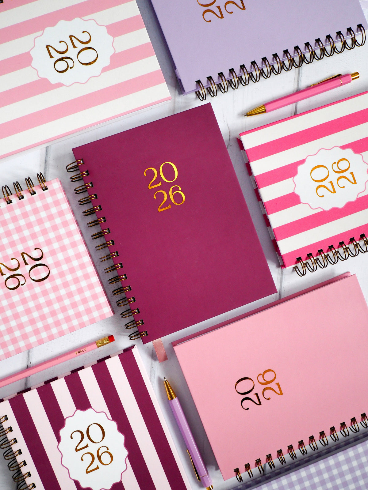 Creative Stationery London 2026 Diary collection, main diary is a candy stripe pink design surrounded by a lilac gingham diary, blush gingham, hot pink candy stripe and blush 2026 diary.