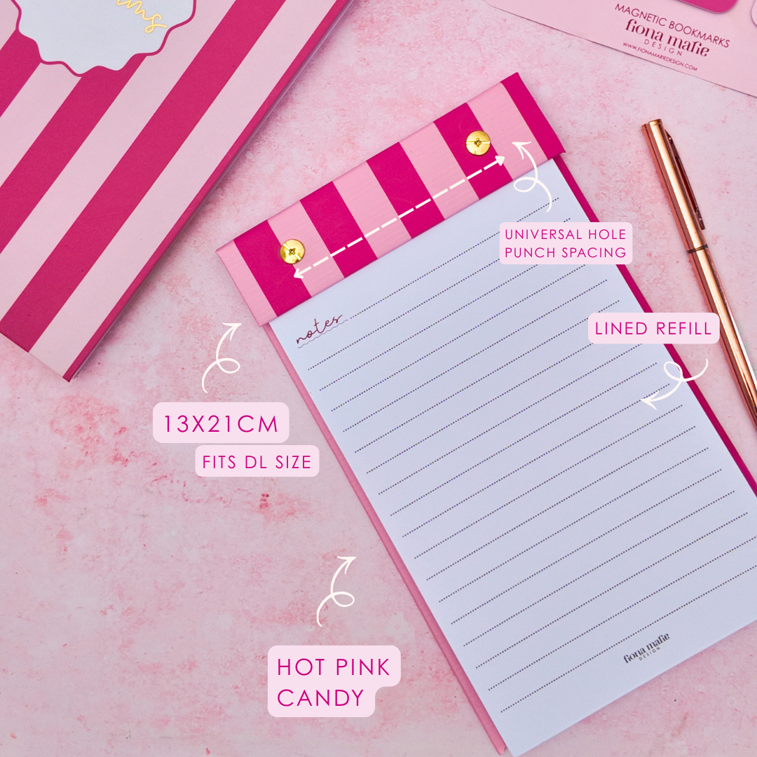Pink striped lined refill notepad shown with its matching box and accessories on a pink background, with text callouts describing the size and features.